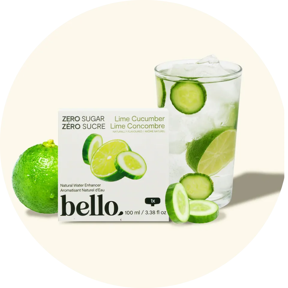 Lime cucumber zero-sugar natural water enhancer product packaging displayed beside a glass of infused water with fresh lime and cucumber slices.